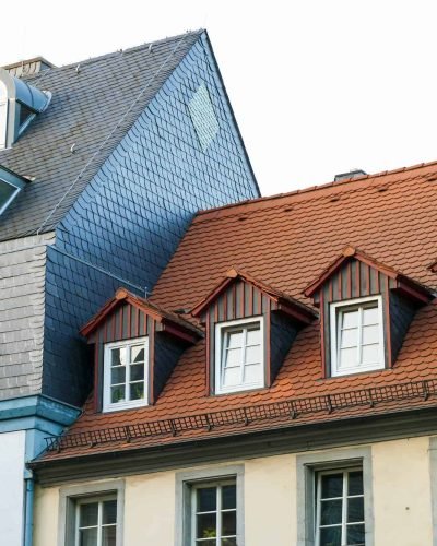 roofs-of-old-houses-with-roof-windows-and-orange-roof-tiles-in-german-city.jpg